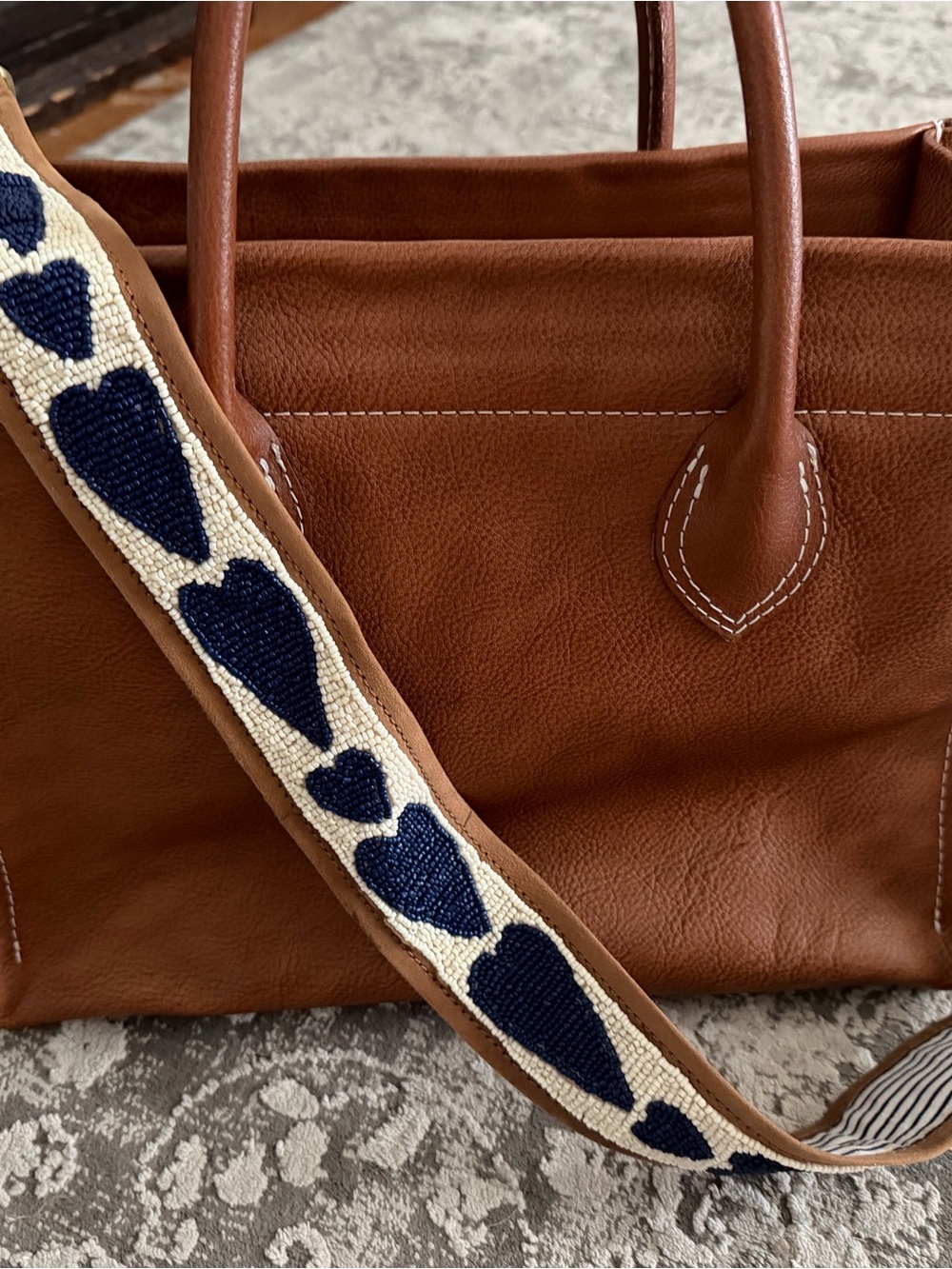 Brown Leather Tote with Navy Heart-Pattern Strap